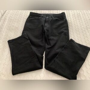 Men’s black Levi’s jeans.